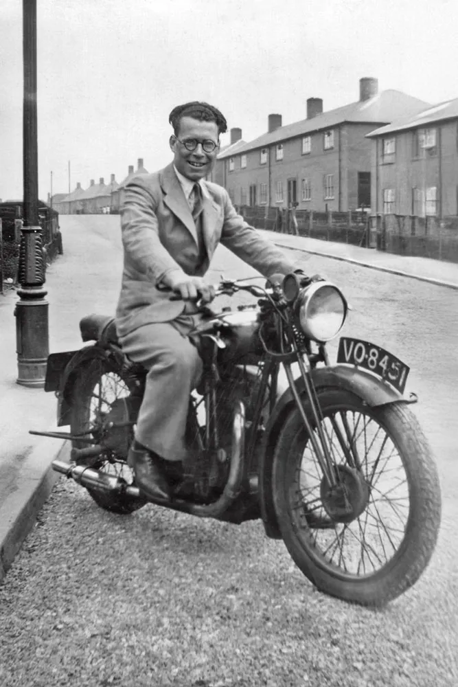 Walter Upton sitting astride his motorcycle, registration VO 8451, photographed on a street in Nottingham in the late 1930s.